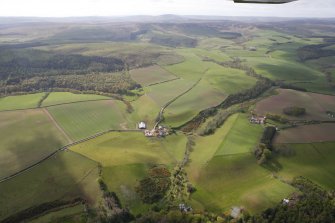 General oblique aerial view of Pressmennan Wood, Pressmennan Loch and Ruchlaw West Mains, looking S.