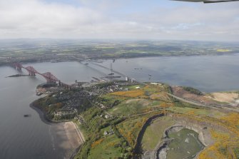 General oblique aerial view of Forth Rail Bridge, Forth Road Bridge, North Queensferry, Cruicks Quarry and construction of Queensferry Crossing, looking SW.