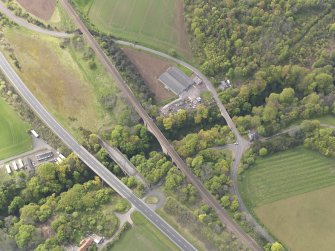 Oblique aerial view of Dunglass New Bridge, Dunglass Viaduct and Dunglass Bridge, looking SSE.