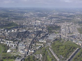 General oblique aerial view of Calton Hill, Royal Mile, Old Town and New Town, looking W.