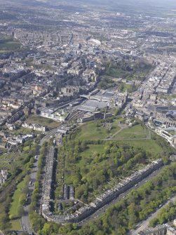 General oblique aerial view of Calton Hill, Royal Mile, Old Town and New Town, Waverley Railway Station, looking SW.