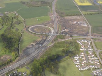 Oblique aerial view of Kirkliston, Queensferry Crossing Access Works, looking W.