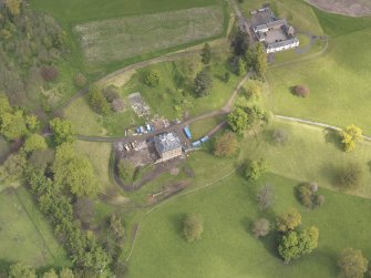 Oblique aerial view of Pitlour House, Pitlour Park, looking NE.