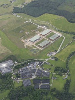 Oblique aerial view of the Macallan Distillery, looking NNW.