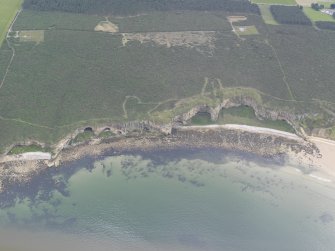 Oblique aerial view of the Covesea Caves, looking SSE.