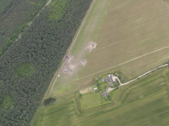 Oblique aerial view of the excavation of the settlement at Clarkly Hill, looking WNW.