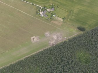 Oblique aerial view of the excavation of the settlement at Clarkly Hill, looking ENE.