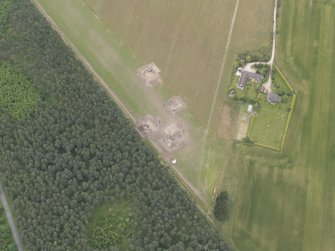 Oblique aerial view of the excavation of the settlement at Clarkly Hill, looking N.