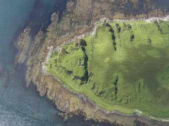 Oblique aerial view of Am Fraoch Eilean and Claig Castle, looking SW.