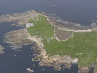 General oblique aerial view of The Tarf, Swona, Loch of the Tarf and Swona Lighthouse, looking NW.