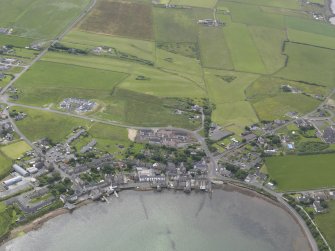 General oblique aerial view of St Margarets Hope and South Ronaldsay Golf Course, looking SW.