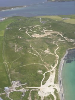 General oblique aerial view of The Bu, Burray, South Ronaldsay and Churchill Barrier No. 2, looking NNW.