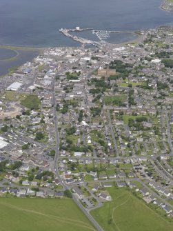 General oblique aerial view of Kirkwall centred on St Magnus Cathedral, looking to the N.