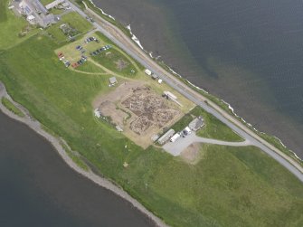 Oblique aerial view of the excavations at Ness of Brodgar, looking S.