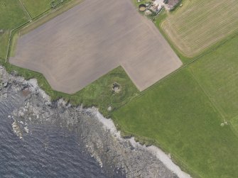Oblique aerial view centred on the Hillock of Burroughston broch, looking W.
