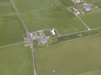 Oblique aerial view centred on Holland, North Ronaldsay, looking N.