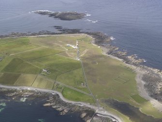 Oblique aerial view centred on Dennis Ness lighthouse, looking N.