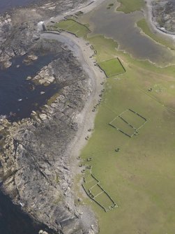 Oblique aerial view centred on the enclosures and planticrues, and the Old Beacon, looking S.