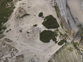 Oblique aerial view of the Links of Noltland excavation area, looking W.