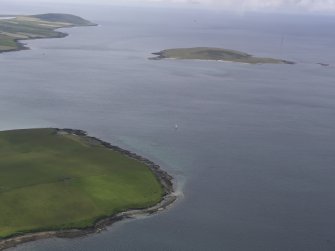 General oblique view over Aiker Ness to Eynhallow, looking NW.