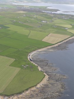 General oblique view over Breckness House to Stromness, looking SE.