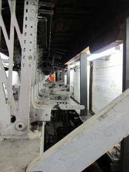 Interior. Locking Room, from north west, locking tray at top of picture, levers and their tails. the chains attached to the lever tails engagewith wires which operate the signals soem distance from the signal box.
