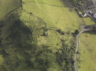 Oblique aerial view of Knockdavie Castle, looking to the NE.