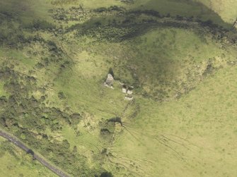 Oblique aerial view of Knockdavie Castle, looking to the NNW.