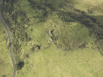 Oblique aerial view of Knockdavie Castle, looking to the NW.