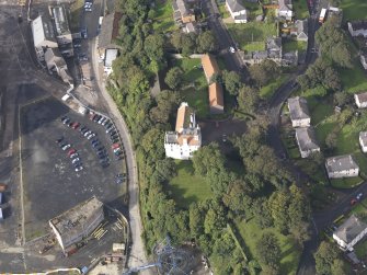 Oblique aerial view of Rossend Castle, looking to the W.