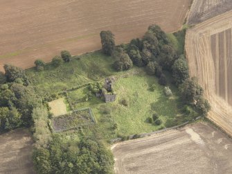 Oblique aerial view of Piteadie Castle, looking to the ENE.