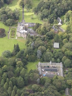 General oblique aerial view of Carberry Tower with adjacent stable block and Italian Garden, looking to the W.