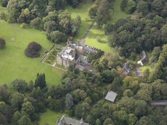 General oblique aerial view of Carberry Tower with adjacent stable block and Italian Garden, looking to the WNW.