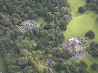 General oblique aerial view of Carberry Tower with adjacent stable block and Italian Garden, looking to the SE.