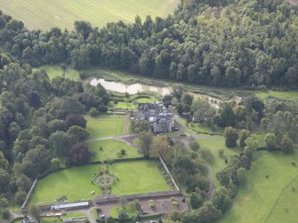 General oblique aerial view of Winton House with adjacent walled garden, looking to the S.