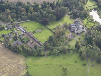 General oblique aerial view of Winton House with adjacent walled garden, looking to the ESE.