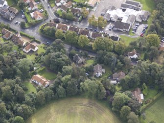 Oblique aerial view of Winton House South Lodge, looking to the SSE.