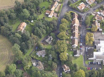 Oblique aerial view of Winton House South Lodge, looking to the E.