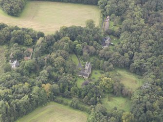 General oblique aerial view of Fountainhall Country House with adjacent stables, looking to the SW.
