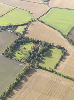 General oblique aerial view of Pilmuir House with adjacent dovecot, looking to the SW.