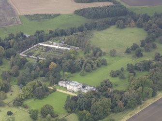 General oblique aerial view of Preston Hall with adjacent walled garden, looking to the NNW.