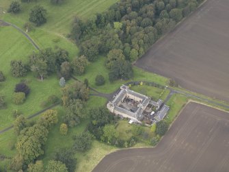 Oblique aerial view of Preston Hall stables, looking to the N.