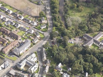 Oblique aerial view of Newbattle Abbey West Lodge, looking to the E.