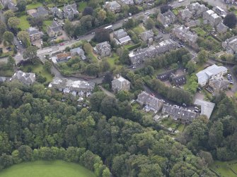 Oblique aerial view of Eskbank House, looking to the S.