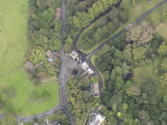 Oblique aerial view of Newbattle Abbey Port Gate North Lodge, looking to the N.