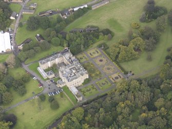 Oblique aerial view of Newbattle Abbey House, looking to the N.