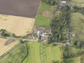 Oblique aerial view of Roseberry Home Farm, looking to the W.