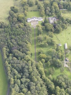 General oblique aerial view of Middleton Hall with adjacent stables, looking to the E.