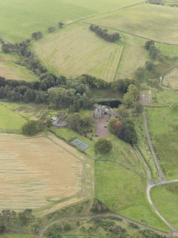 Oblique aerial view of Cakemuir Castle, looking to the SW.