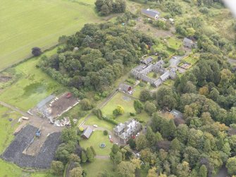 General oblique aerial view of Gowanbank steading with adjacent farmhouse and dairy, looking to the ESE.